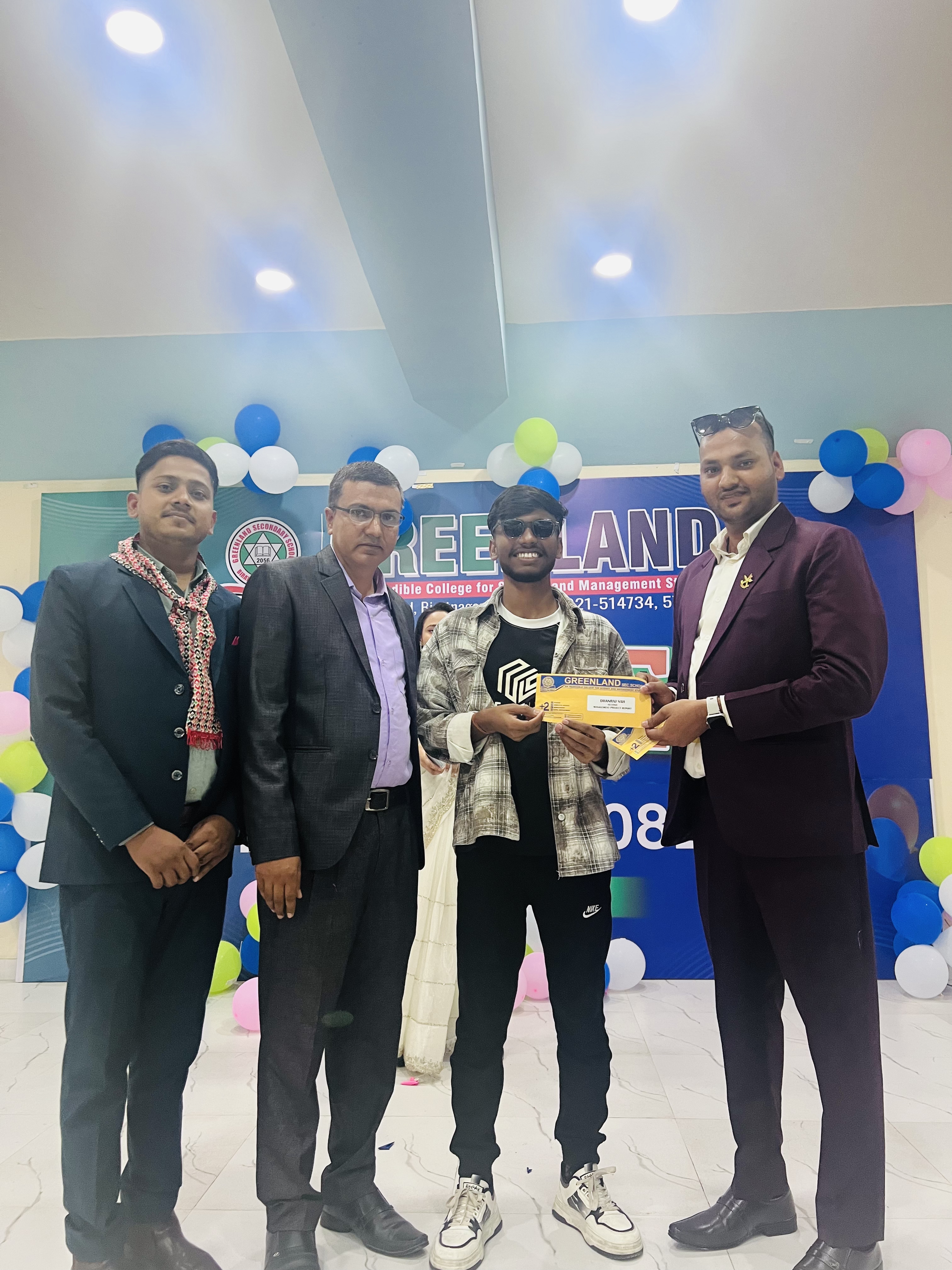 Dhanraj Sah receiving second position award for presentation at Arihant Multi-fiber Ltd